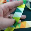 ⁦סרט קישוט ברוחב 25 מ"מ דגם משולשים⁩ – תמונה ⁦5⁩